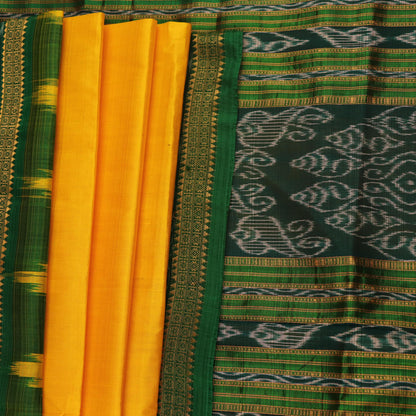 Yellow Khandua silk saree draped, showcasing its simple elegance and the plain body.