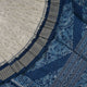 Close-up of premium fabric texture and handloom weave on a white and blue Sambalpuri silk saree
