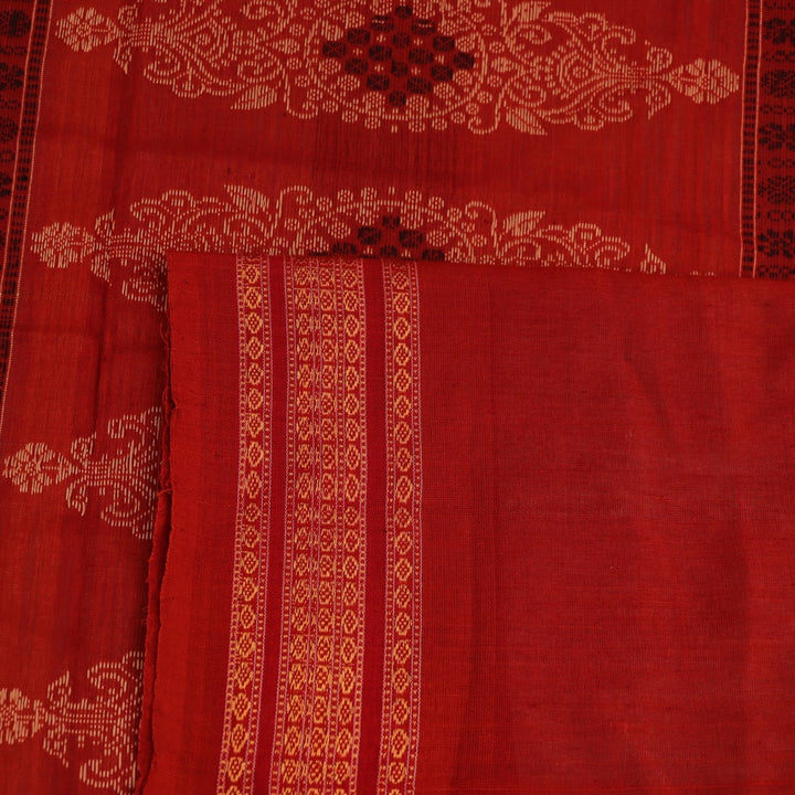 Full view of a handloom green and rust Bomkai cotton saree with butta pattern.
