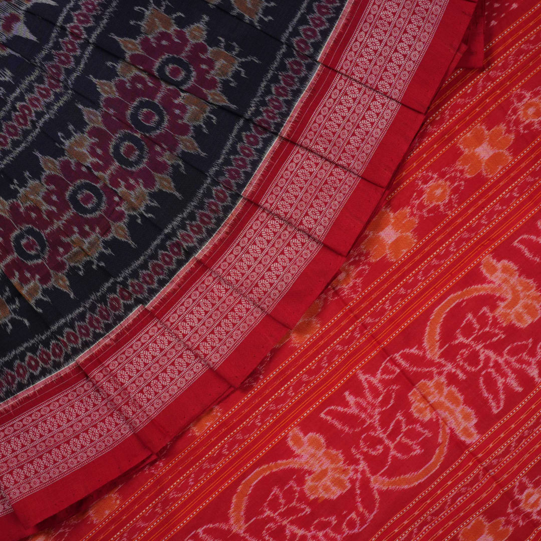 Full flat layout of a black and red Sambalpuri cotton saree showing the complete design, pallu, and border.