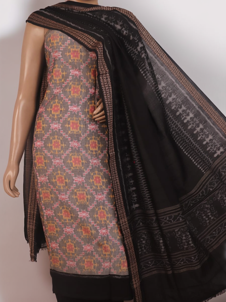 Close-up of Sambalpuri cotton dress material blouse piece in grey and black with motifs.