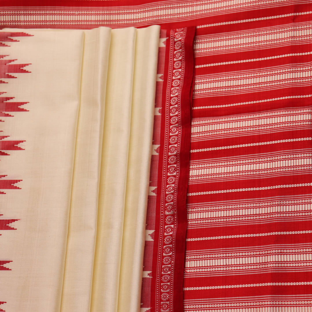 Close-up of plain white silk fabric with intricate Berhampuri weaving in red