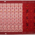 Full view of a white and red Sambalpuri cotton saree with traditional motifs.