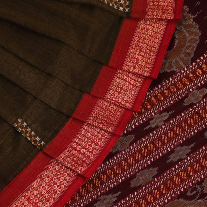 Full view of a green and red Bomkai cotton handloom saree with a butta pattern.