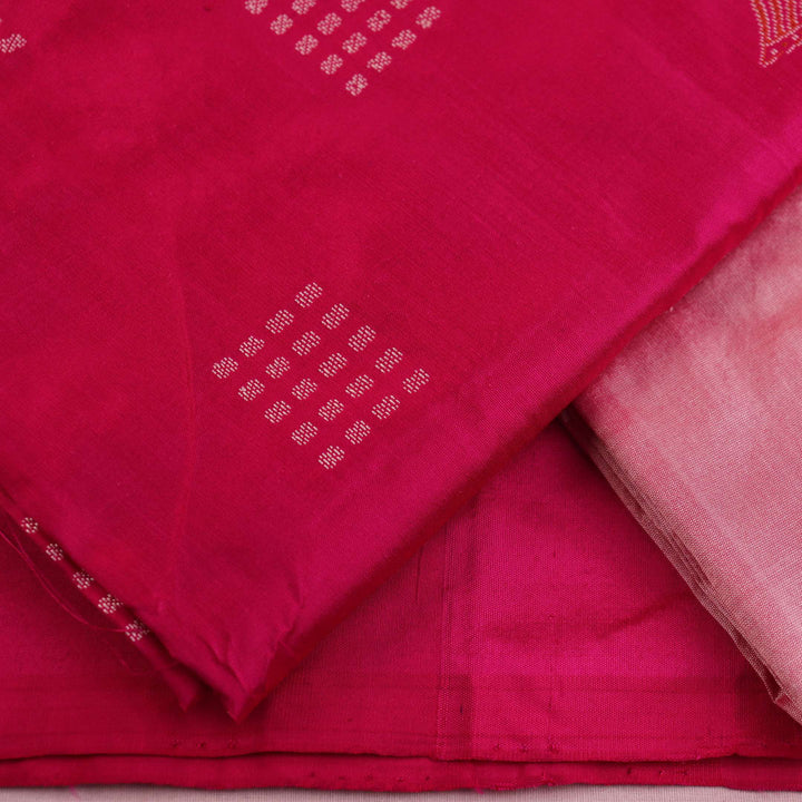 Close-up of Pink and Peach Bomkai Silk Dress Material's Butta pattern blouse piece.