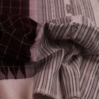 Maroon and white Sambalpuri cotton dupatta draped over a mannequin