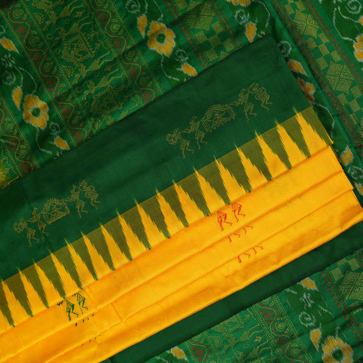 Extreme close-up of yellow Bomkai Silk Saree fabric, revealing the rich silk texture and weave.
