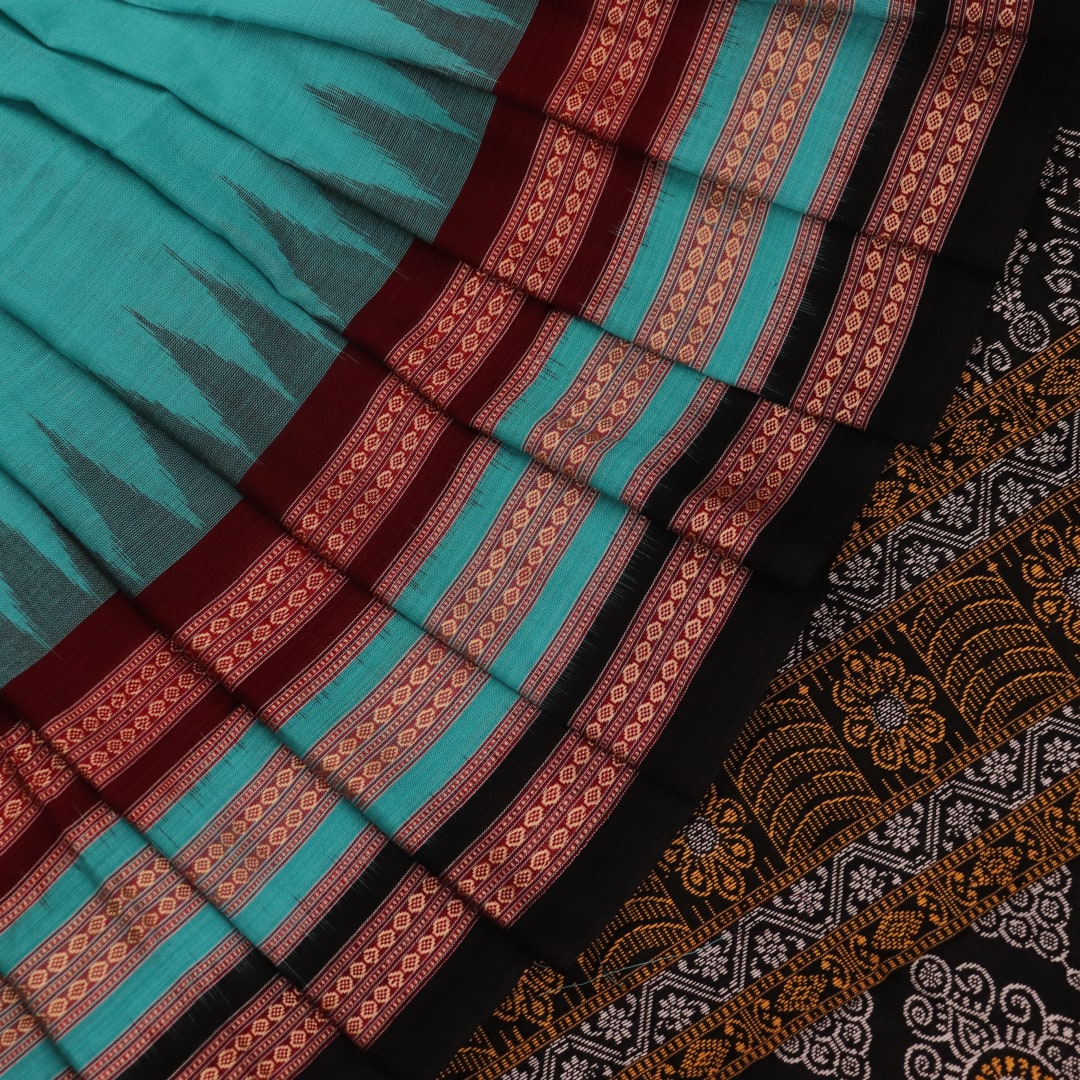 Full view of a blue and black Bomkai cotton saree with intricate butta pattern.