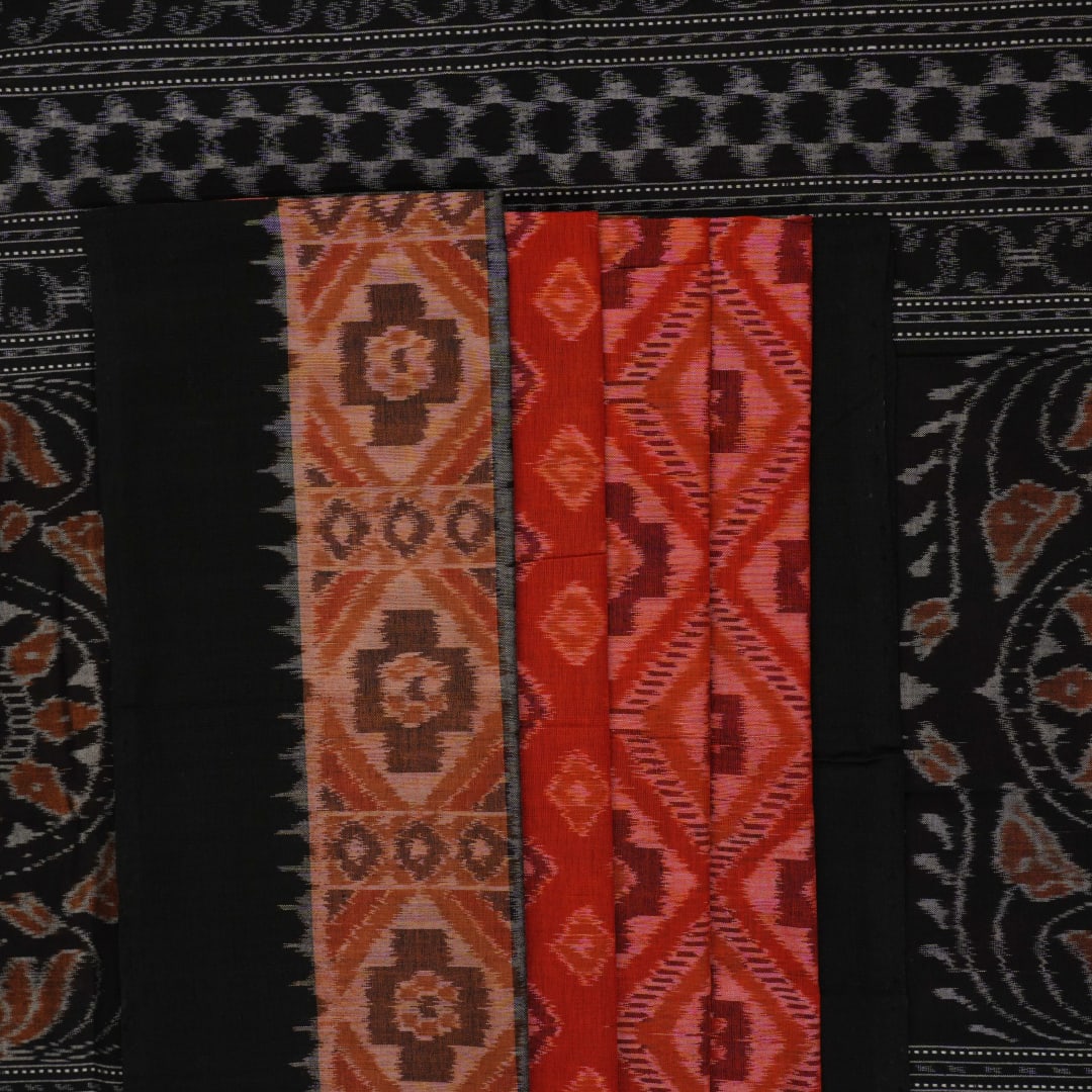 Full layout of the orange and black Sambalpuri cotton saree displaying the complete pattern and design.