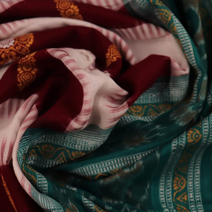 Full view of a multicolored green Bomkai cotton saree with butta pattern.