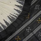 Close-up of the luxurious Berhampuri Silk Saree fabric, revealing the fine weave and soft texture.