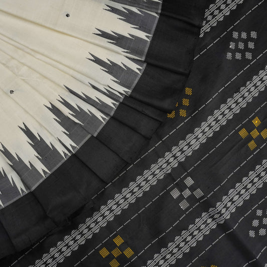 Close-up of the luxurious Berhampuri Silk Saree fabric, revealing the fine weave and soft texture.