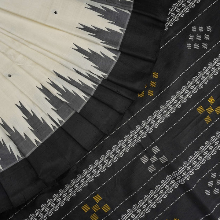 Close-up of the luxurious Berhampuri Silk Saree fabric, revealing the fine weave and soft texture.