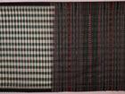 Full view of a green and black Sambalpuri cotton saree with motifs.