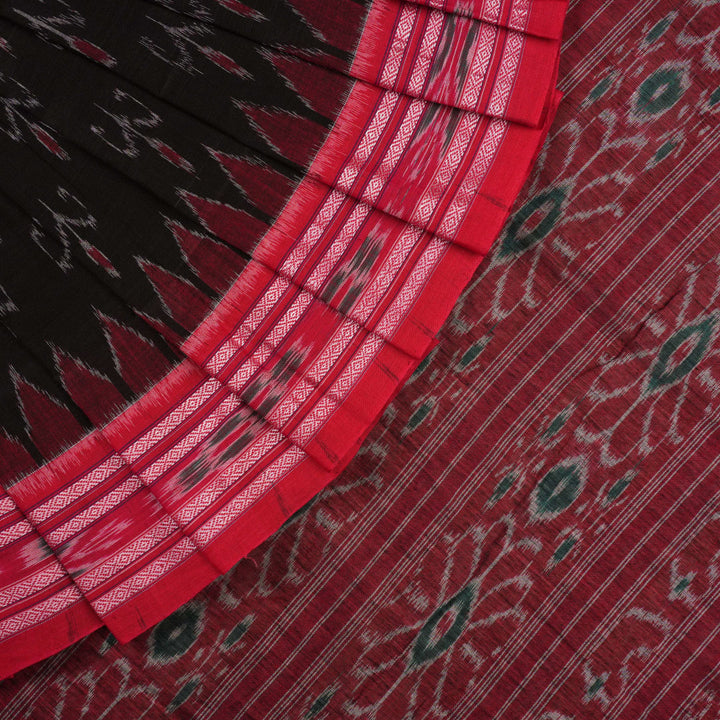 Model draped in a black and red Sambalpuri cotton saree showing traditional Odisha handloom styling.
