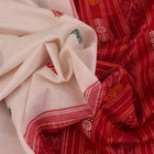Full view of a white and green cotton handloom Bomkai saree with butta pattern.