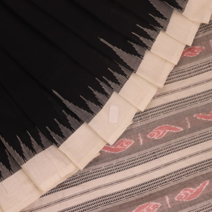 Full view of a plain black and white Sambalpuri cotton handloom saree.