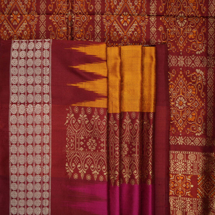 Ultra close-up of Bomkai silk saree fabric, revealing its luxurious texture and fine handloom weave.