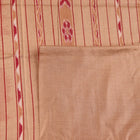 Close-up of plain red and off-white Tussar silk saree fabric texture.