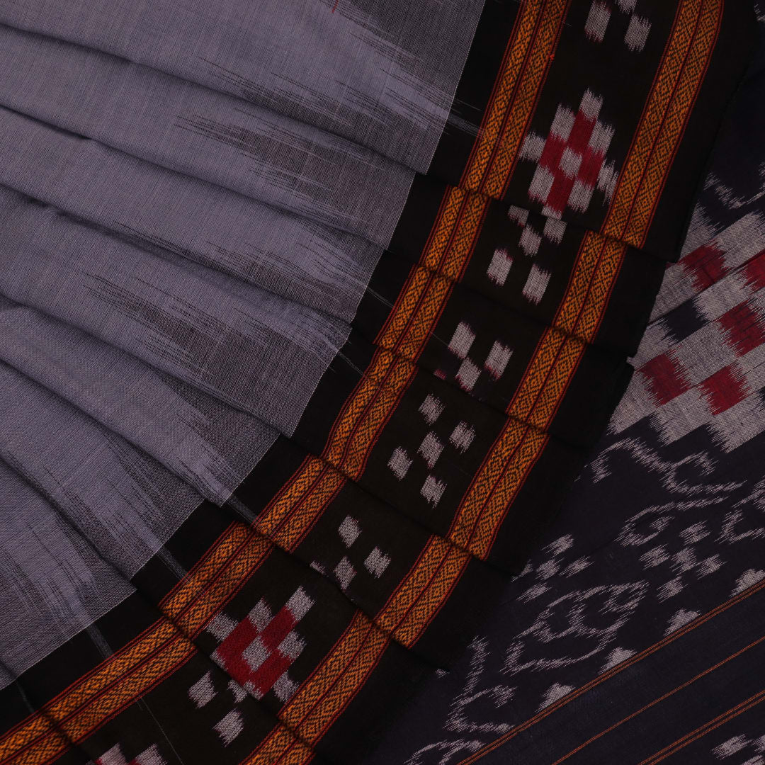 A draped handloom Sambalpuri cotton saree with motifs in grey and black