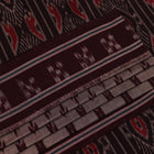 Elegantly draped grey Sambalpuri cotton saree with maroon motifs.
