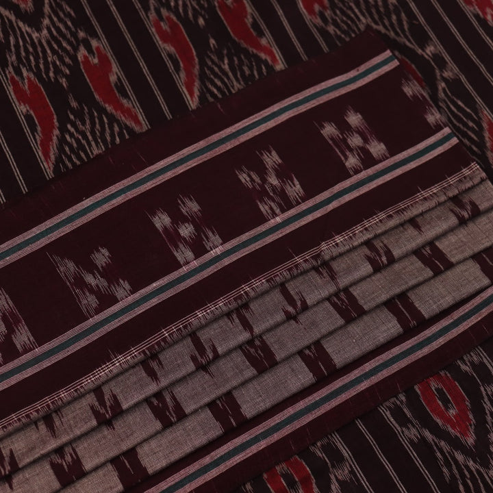 Elegantly draped grey Sambalpuri cotton saree with maroon motifs.