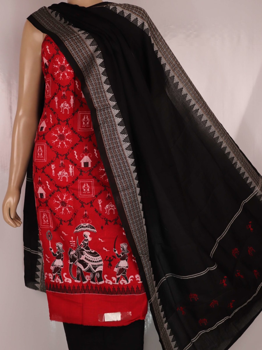 Close-up showcasing the intricate doll pattern on the cotton sambalpuri dress material in red and black.