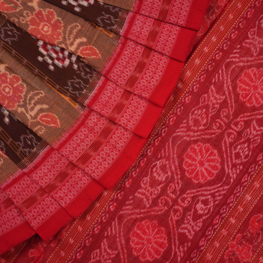 Model draped in brown and red Pasapalli Sambalpuri cotton saree showcasing traditional Odisha handloom
