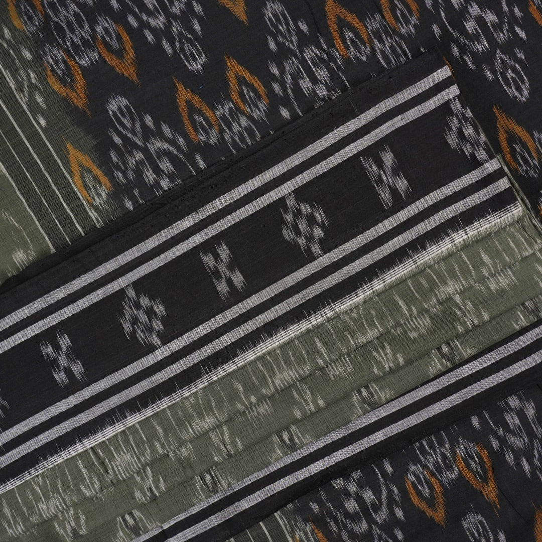 Elegant model drape of the grey and black Sambalpuri cotton saree showcasing traditional handloom motifs.