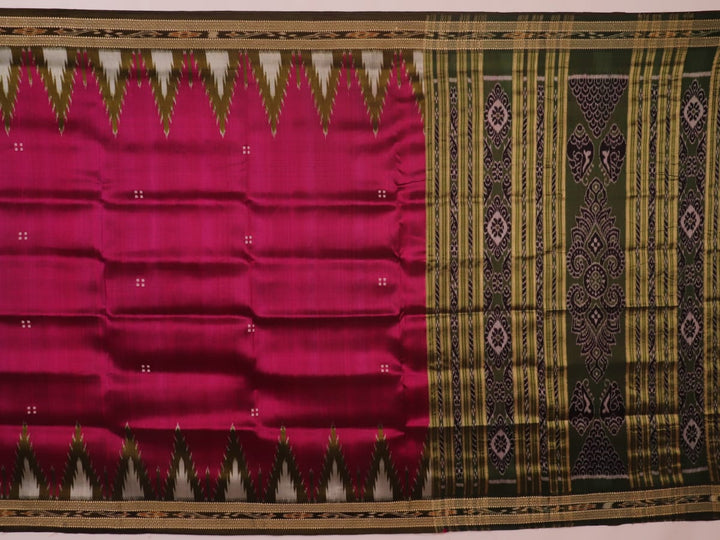 Magenta Khandua silk saree styled; green blouse accentuates the butta pattern and rich drape.