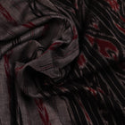Grey and black Sambalpuri cotton saree draped, showcasing overall look and handloom texture.