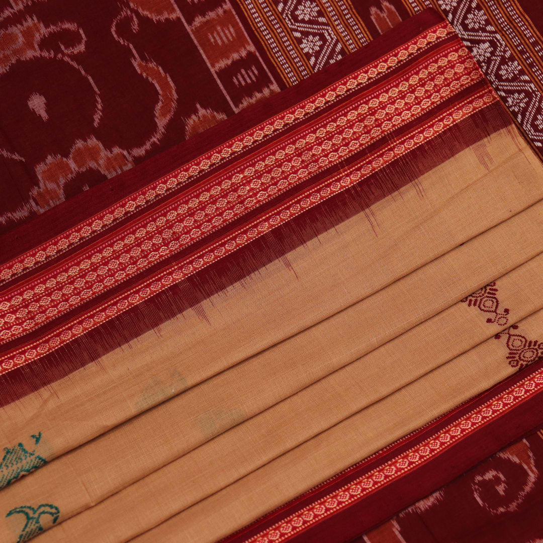 Full view of a traditional brown and maroon Bomkai cotton saree with butta patterns