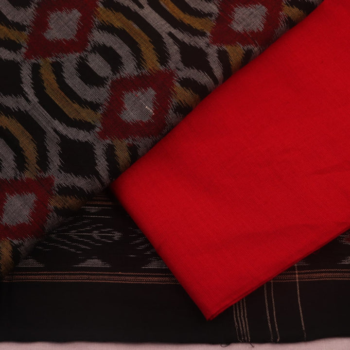 Detail of the black and red motif blouse piece of the Sambalpuri cotton dress material.