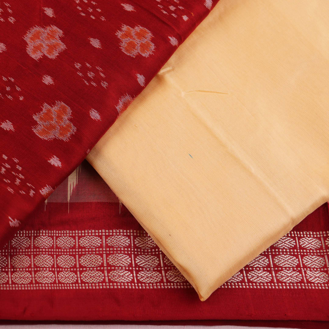 Detail of the Maroon and Off White Sambalpuri Silk Dress Material blouse piece with motifs.
