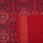 Full flat lay view of a blue and red Sambalpuri cotton saree showcasing the entire body and pallu design.