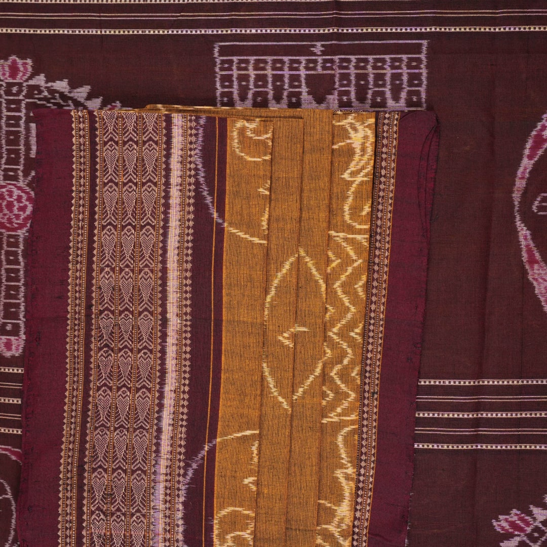 Full layout of the brown and maroon Sambalpuri cotton saree showing the complete body pattern and border.