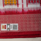 Close-up of the luxurious white Sambalpuri silk saree fabric, highlighting its rich texture and weave.
