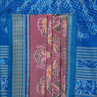 Close-up of the multi-color blue Sambalpuri silk saree fabric texture, highlighting intricate weave.