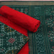 Green & red motif blouse piece detail for Sambalpuri cotton dress material.