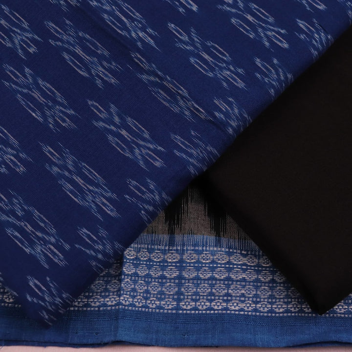 Close-up of Sambalpuri cotton dress material's blue and black body with intricate motifs