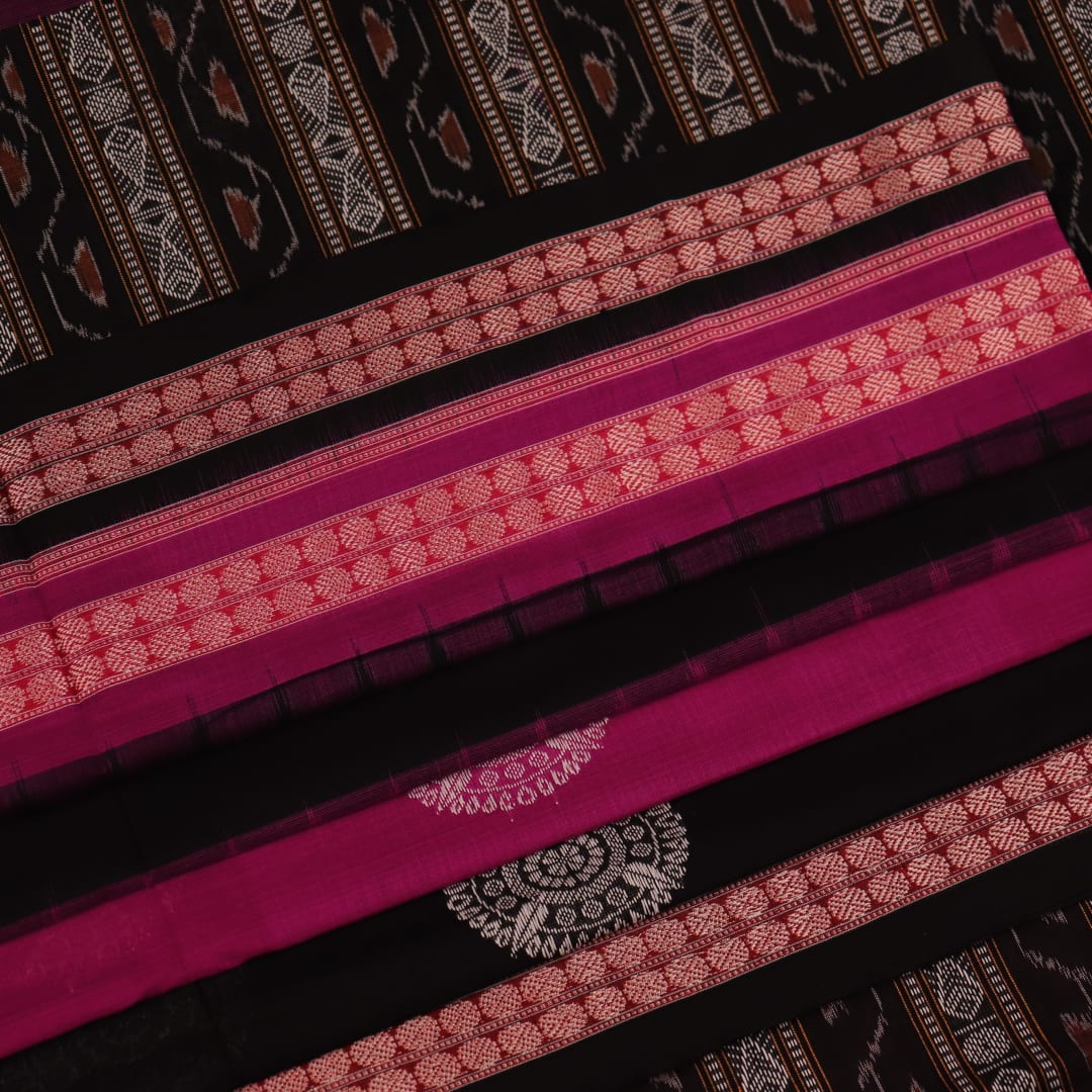 Full view of a magenta and black Bomkai cotton saree with intricate butta patterns.