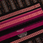 Full view of a magenta and black Bomkai cotton saree with intricate butta patterns.