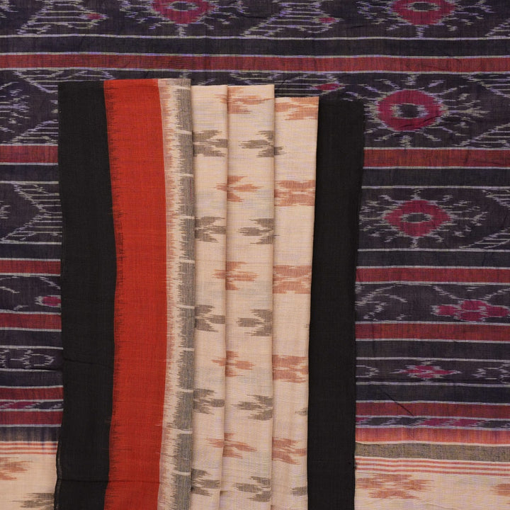 Full styling of a cream and black Sambalpuri cotton saree with traditional motifs on a model.