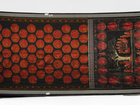 Close-up of the luxurious black Sambalpuri silk fabric, highlighting its rich texture and weave.