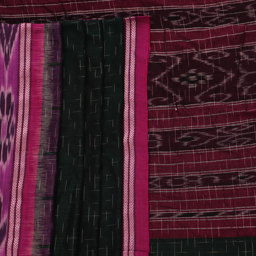 A model drapes an elegant green and magenta Sambalpuri cotton saree with a Pasapalli pattern, showcasing its intricate design and flowing form.