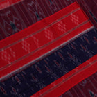 Blue Sambalpuri cotton saree draped, showcasing motifs and styling.