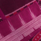 Plain pink and violet Sambalpuri cotton saree elegantly draped.