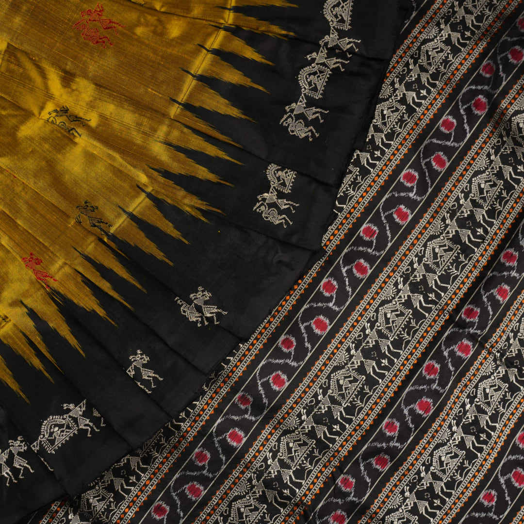 Macro close-up of Bomkai Silk Saree fabric, showing intricate brown & black silk weave.