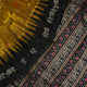 Macro close-up of Bomkai Silk Saree fabric, showing intricate brown & black silk weave.
