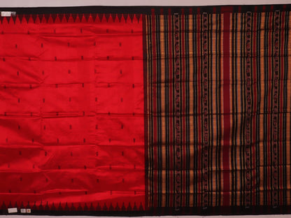 Textured close-up of red and black Sambalpuri Silk Saree fabric, highlighting the woven butta pattern.